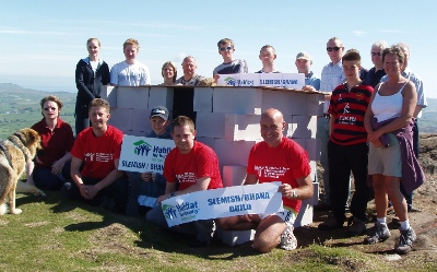 The team from Ballymena with their house on top of Slemish Mountain.